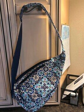 Vera Bradley Essential Sling Backpack in the Lisbon Medallion pattern